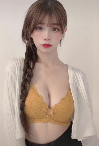 3. Hot c.0214 Shows Cleavage in Yellow Bra
