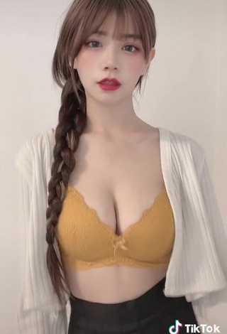 5. Hot c.0214 Shows Cleavage in Yellow Bra