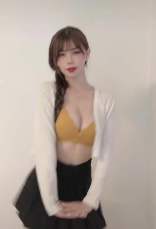 5. Sexy c.0214 Shows Cleavage in Yellow Bra
