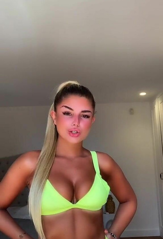 2. Carla Frigo Looks Sexy in Bikini Top and Bouncing Tits