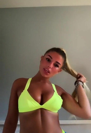 6. Carla Frigo Shows Cleavage in Appealing Bikini Top