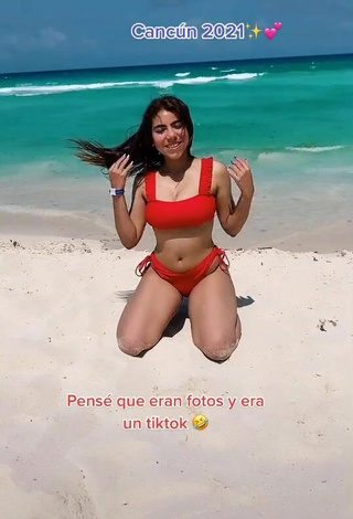 2. Sexy Valentina Shows Cleavage in Red Bikini at the Beach