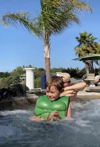 6. Beautiful Devenity Perkins in Sexy Green Bikini Top at the Pool