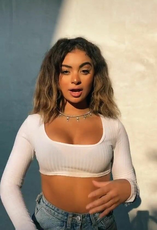 2. Elegant Devenity Perkins Shows Cleavage in White Crop Top and Bouncing Tits