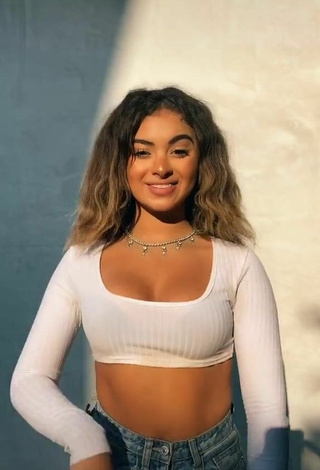 3. Elegant Devenity Perkins Shows Cleavage in White Crop Top and Bouncing Tits