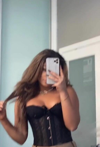 6. Sexy Devenity Perkins Shows Cleavage in Black Corset