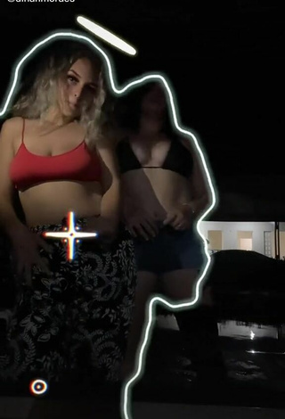 2. Sexy Dinah Moraes Shows Cleavage in Bikini Top