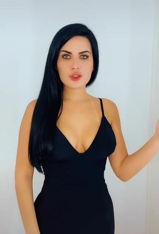 Beautiful Dine Azevedo Shows Cleavage in Sexy Black Dress