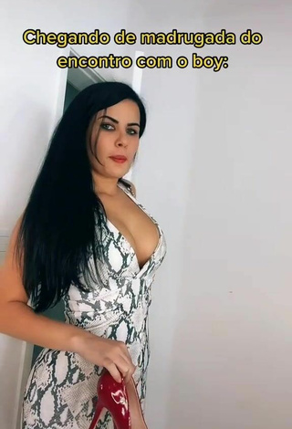 Sweetie Dine Azevedo Shows Cleavage in Snake Print Dress