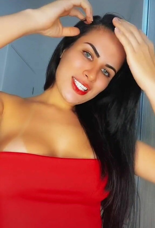3. Seductive Dine Azevedo Shows Cleavage in Red Top