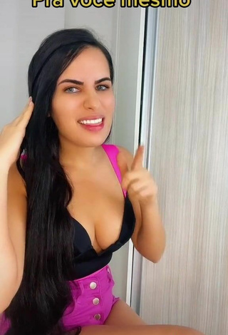 5. Sweetie Dine Azevedo Shows Cleavage in Black Top