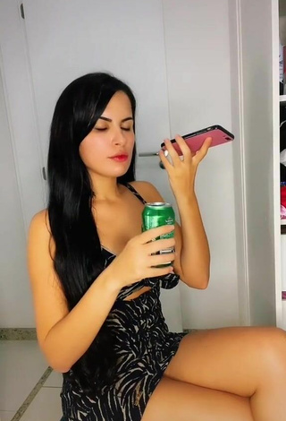 Sexy Dine Azevedo Shows Cleavage in Dress