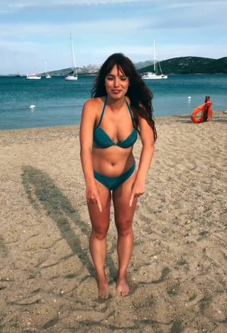 2. Hot Eleonora Olivieri Shows Cleavage in Turquoise Bikini at the Beach and Bouncing Tits