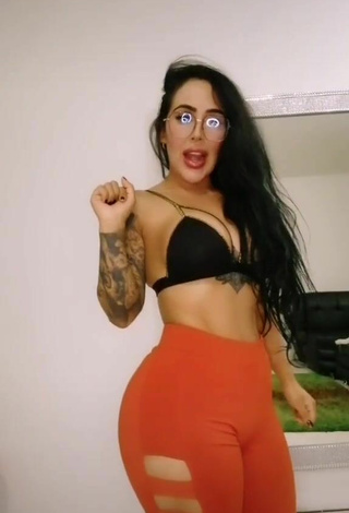 Hot Eve Herrera Shows Cleavage in Black Bikini Top