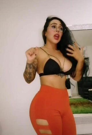 2. Hot Eve Herrera Shows Cleavage in Black Bikini Top