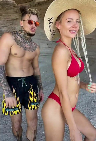 Sexy fit.lovers Shows Cleavage in Red Bikini at the Beach