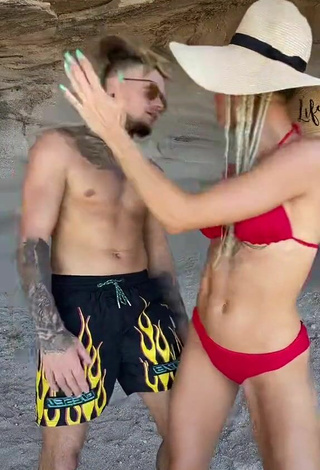 6. Sexy fit.lovers Shows Cleavage in Red Bikini at the Beach
