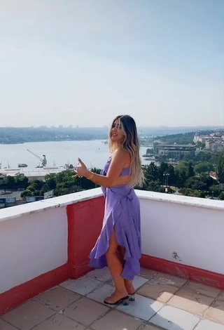 Sweetie Gizemjelii in Purple Crop Top on the Balcony