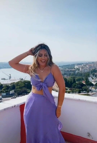 3. Sweetie Gizemjelii in Purple Crop Top on the Balcony