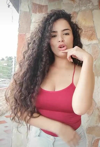 2. Adorable Gleidy Rojas Shows Cleavage in Seductive Red Top