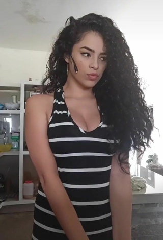 Cute Gleidy Rojas Shows Cleavage in Striped Dress
