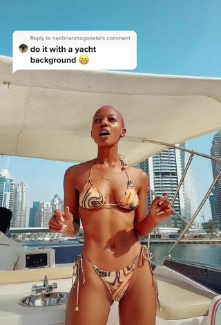 Beautiful Vivian Gold Kaitetsi Shows Cleavage in Sexy Bikini on a Boat