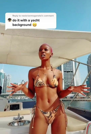 2. Beautiful Vivian Gold Kaitetsi Shows Cleavage in Sexy Bikini on a Boat