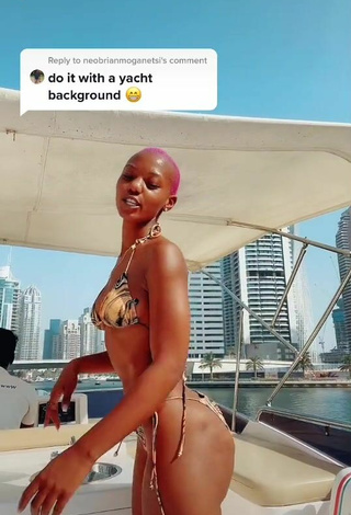 4. Beautiful Vivian Gold Kaitetsi Shows Cleavage in Sexy Bikini on a Boat