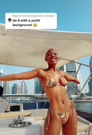 6. Beautiful Vivian Gold Kaitetsi Shows Cleavage in Sexy Bikini on a Boat