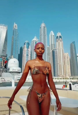 Sweetie Vivian Gold Kaitetsi Shows Cleavage in Bikini on a Boat
