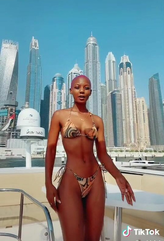 4. Sweetie Vivian Gold Kaitetsi Shows Cleavage in Bikini on a Boat