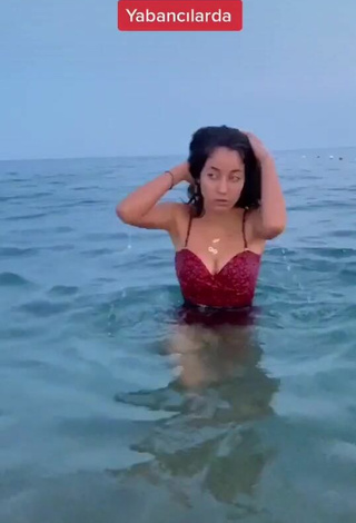 2. Sexy Haticeaknn Shows Cleavage in Red Swimsuit in the Sea