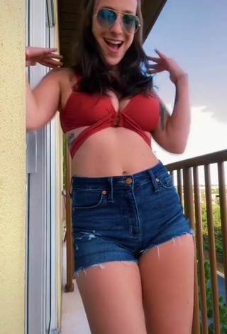 3. Hot Kat Stuckey Shows Cleavage in Red Bikini Top
