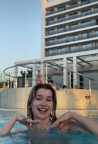 6. Sexy Rina Shows Cleavage in Blue Bikini Top at the Swimming Pool