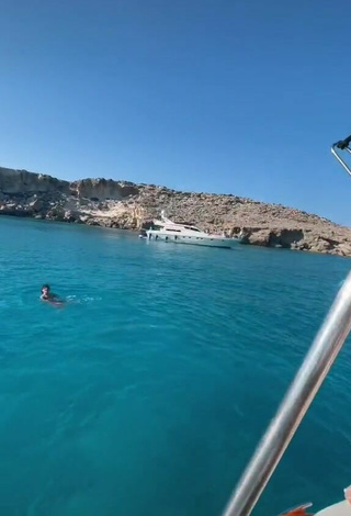 4. Hot Rina in Blue Bikini on a Boat