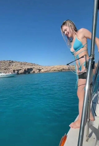 6. Hot Rina in Blue Bikini on a Boat