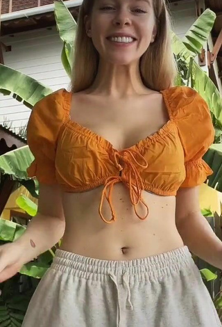 3. Sexy Ira Blanc in Orange Crop Top