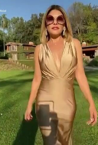 Sexy Tati Cantoral in Golden Dress