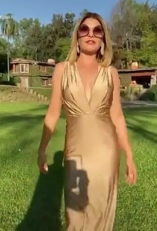 2. Sexy Tati Cantoral in Golden Dress