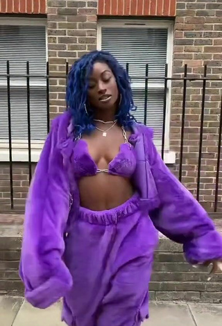 Sexy Oluwanifewa Agunbiade Shows Cleavage in Violet Bikini Top in a Street