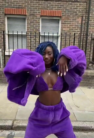 4. Sexy Oluwanifewa Agunbiade Shows Cleavage in Violet Bikini Top in a Street