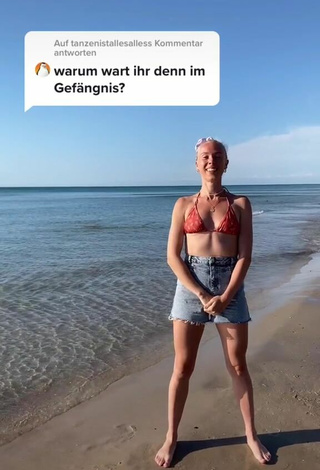 1. Sexy Zoe in Orange Bikini at the Beach