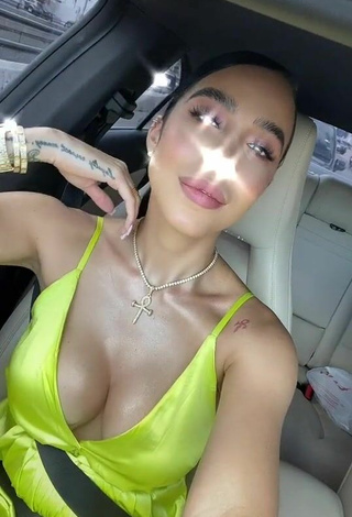 Hottest Jessi Pereira Shows Cleavage in Green Dress in a Car