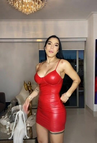 Sexy Jessi Pereira Shows Cleavage in Red Dress without Bra