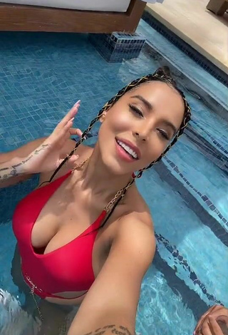 Sexy Jessi Pereira Shows Cleavage in Red Swimsuit at the Pool