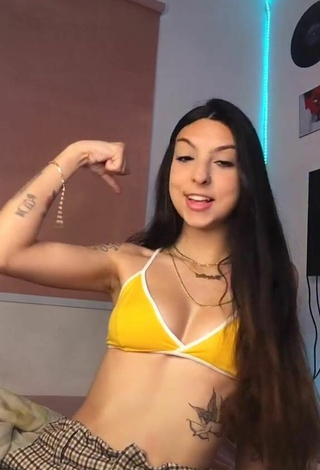 3. Julia Guerra Looks Erotic in Yellow Bikini Top