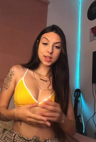 4. Julia Guerra Looks Erotic in Yellow Bikini Top