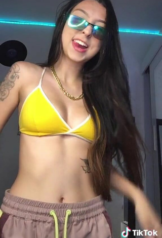 6. Julia Guerra Shows Cleavage in Nice Yellow Bikini Top