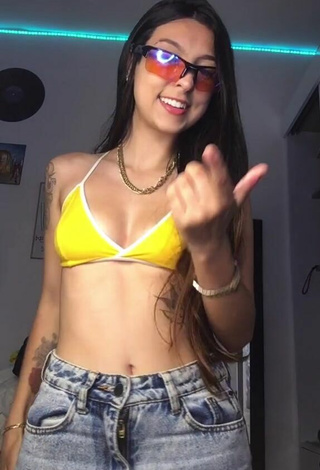 2. Attractive Julia Guerra Shows Cleavage in Yellow Sport Bra and Bouncing Boobs
