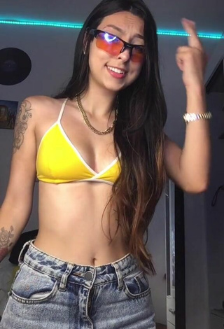 3. Attractive Julia Guerra Shows Cleavage in Yellow Sport Bra and Bouncing Boobs